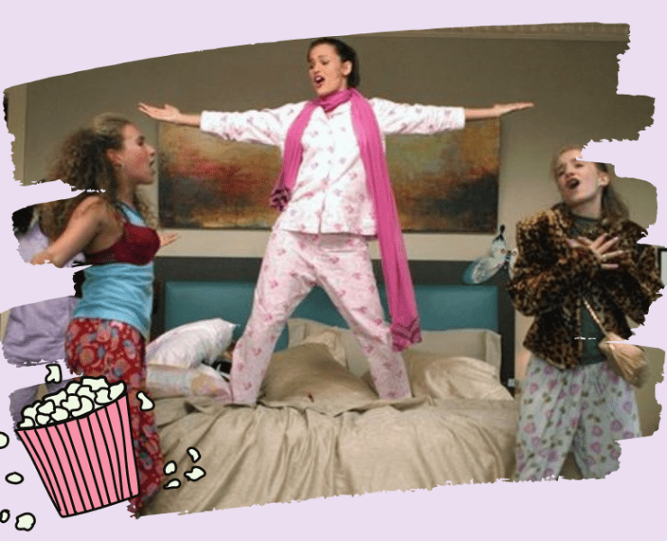a picture to accompney an article titled "30 Brilliant Movies To Watch At Your Next Sleepover". It's shows a scene from the movie 13 Going On 30. 3 women sing on the bed at a sleepover